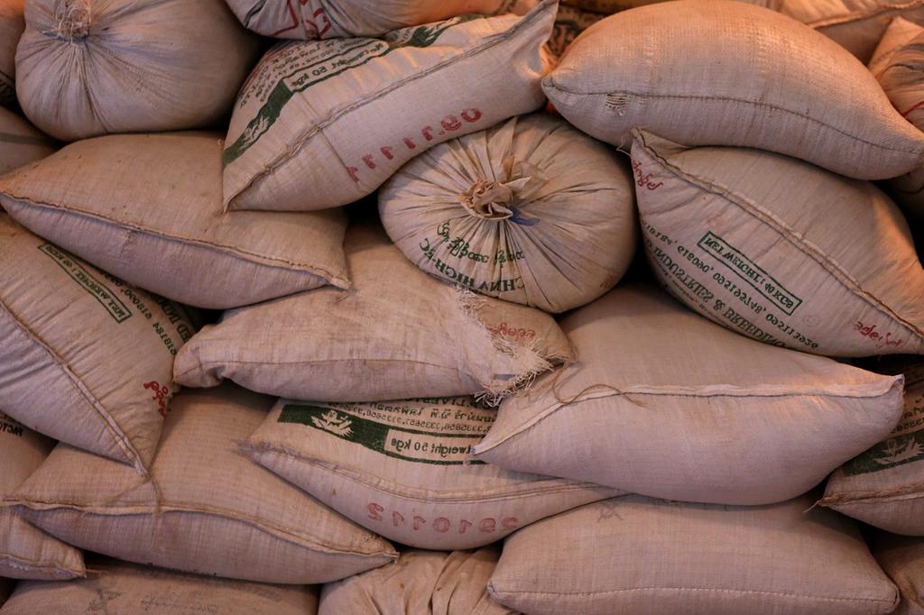Bulk grains and rice sacks in a warehouse